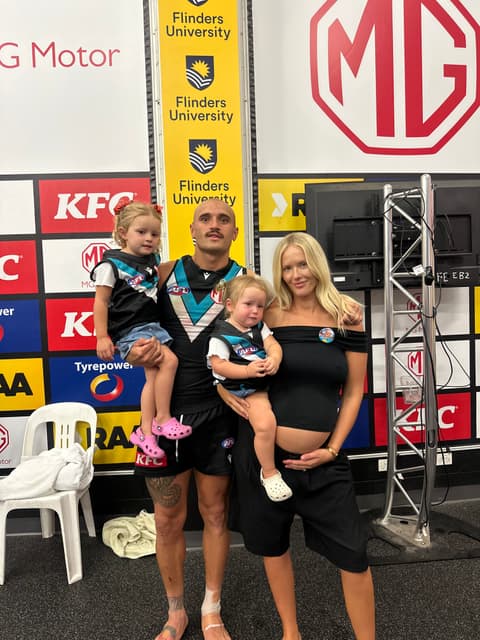 Sam Powell-Pepper with his wife and daughters at a club event.